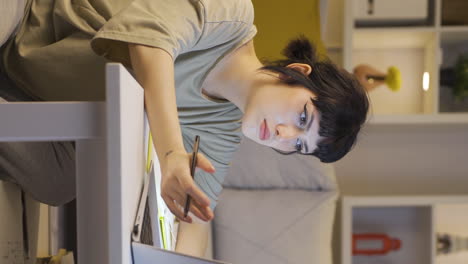 Vertical-video-of-Young-woman-encountering-problem-on-laptop.